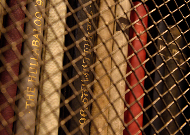 Archival books in caged shelving