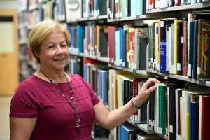 librarian and book shelves