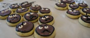 cookies with wrathful faces painted on them
