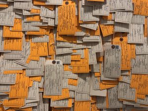 detail of Hostile Terrain toe tags
