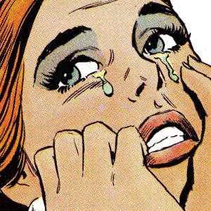 close detail of crying woman from comic book