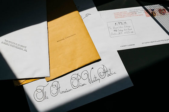 details of hand written essays by incarcerated people