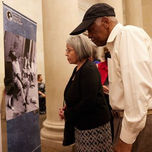 visitors looking at Billie Holiday display at Baltimore Museum of Art