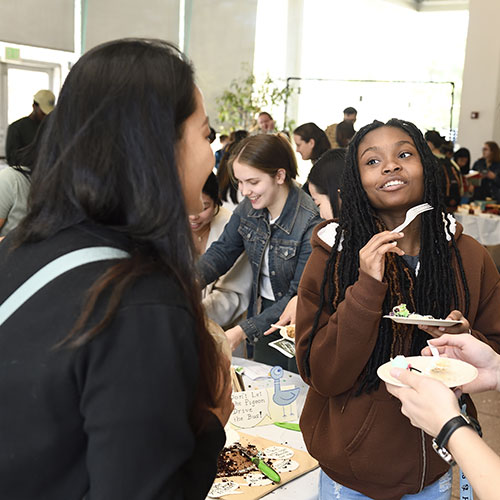 students eating cake at edible book festival