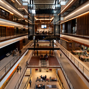 A view of the new atrium at the Johns Hopkins University Bloomberg Center, with glassed-in classrooms and a mini amphitheater on the ground floor. Erin Schaff/The New York Times