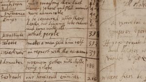 closeup of handwriting on a page in an old book