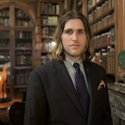 Photo of martin in a library